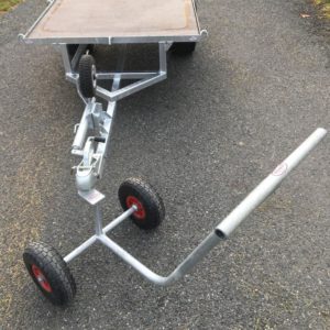 Trolley puller with small flat bed trailer